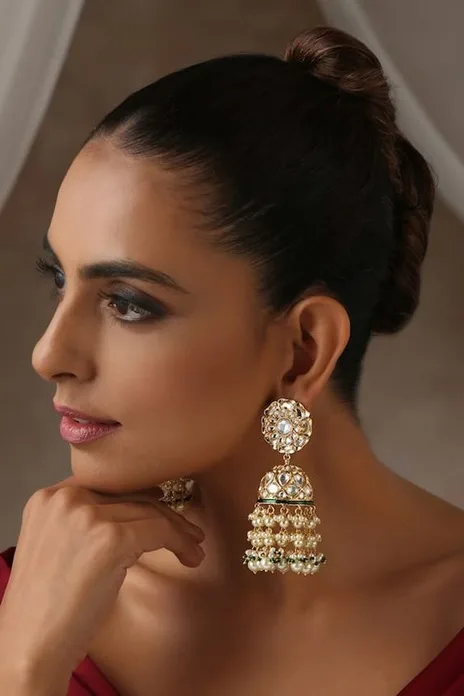 Polki jhumkas are usually larger than other earrings.