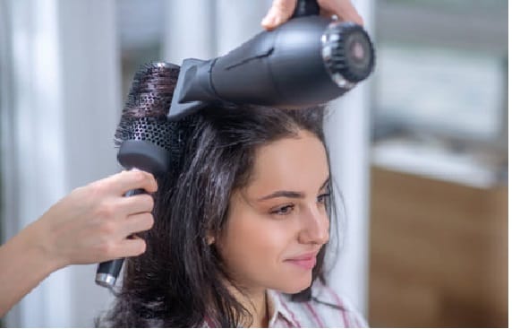 Blow-drying with a round brush is very helpful.