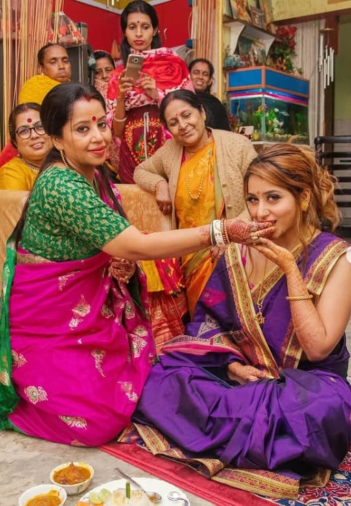 For this ritual, the bride's family cooks her favorite dishes and feeds her with great love.