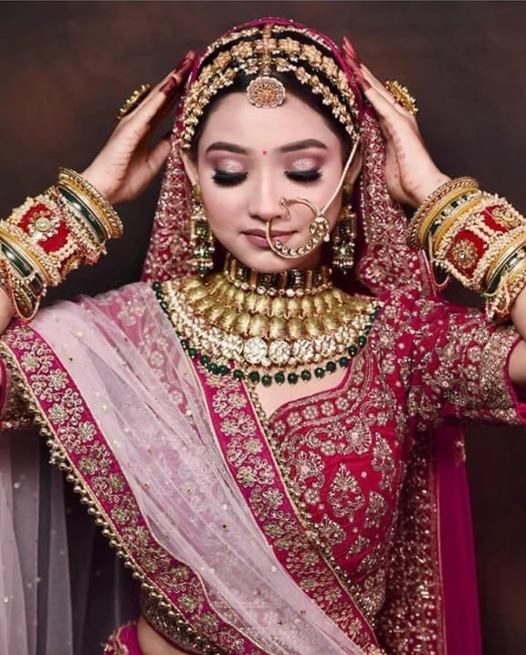 Opt for a sheesh patti or some other bejeweled headgear