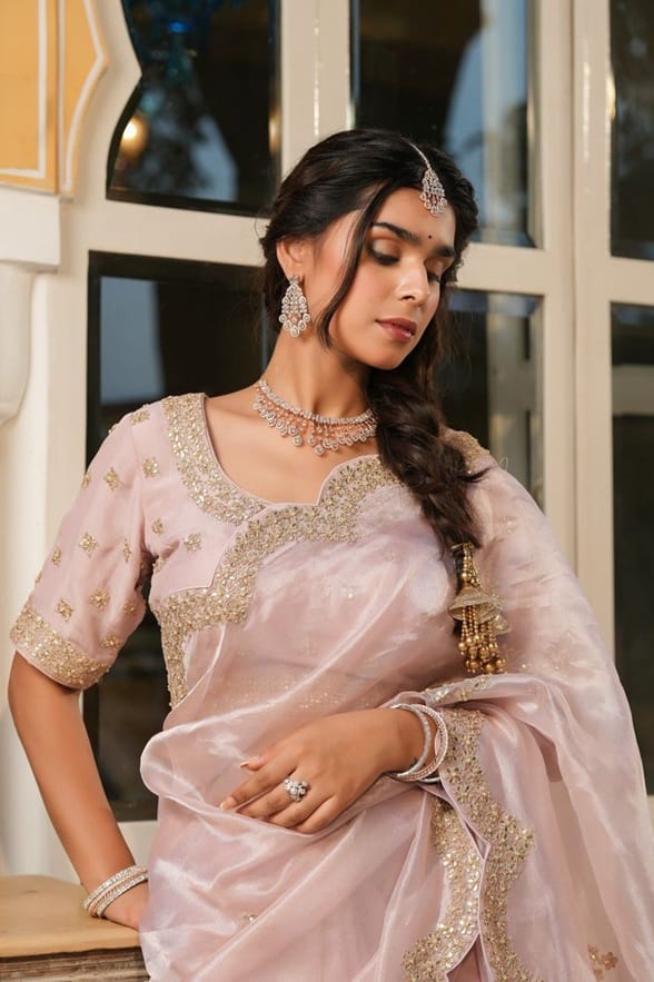 A scallop saree will allow you to do that without shunning the tradition.